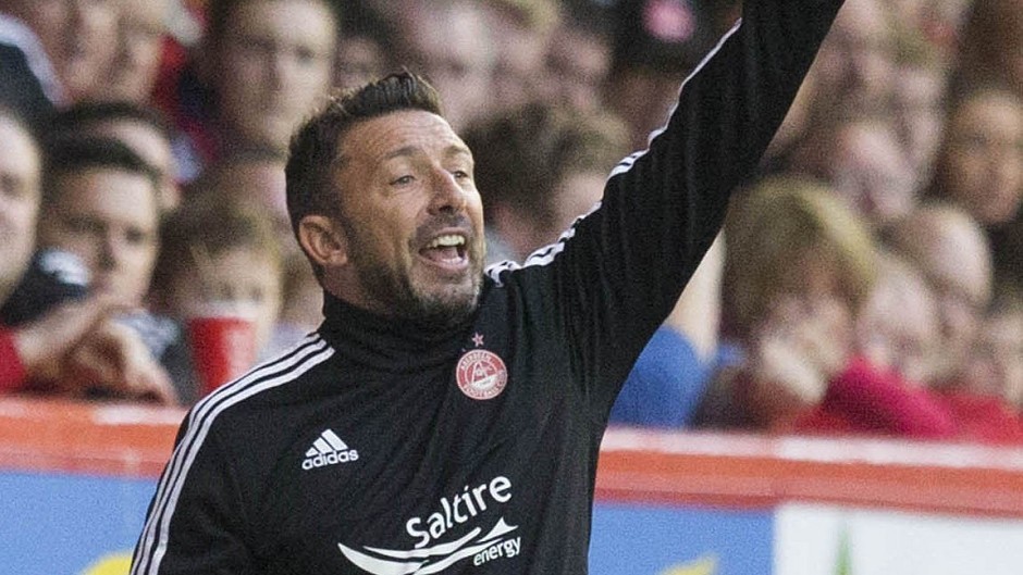 Aberdeen manager Derek McInnes is wary of the threat posed by Hearts