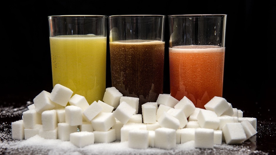 Cancer Research UK has called for a tax on sugary drinks in a bid to curb rising rates of cancer caused by people being overweight