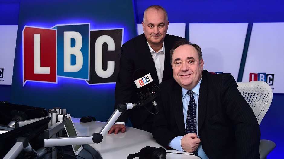 Alex Salmond (right) takes part in his first live weekly phone-in on radio station LBC, hosted by presenter Iain Dale (left)