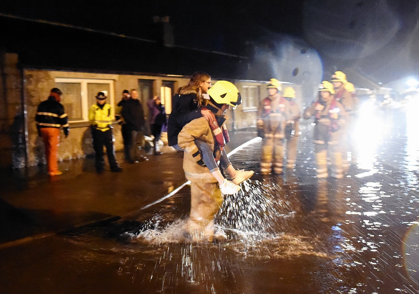 Residents are evacuated by police and fire & rescue service from Canal Road and Crescent at Port Elphinstone