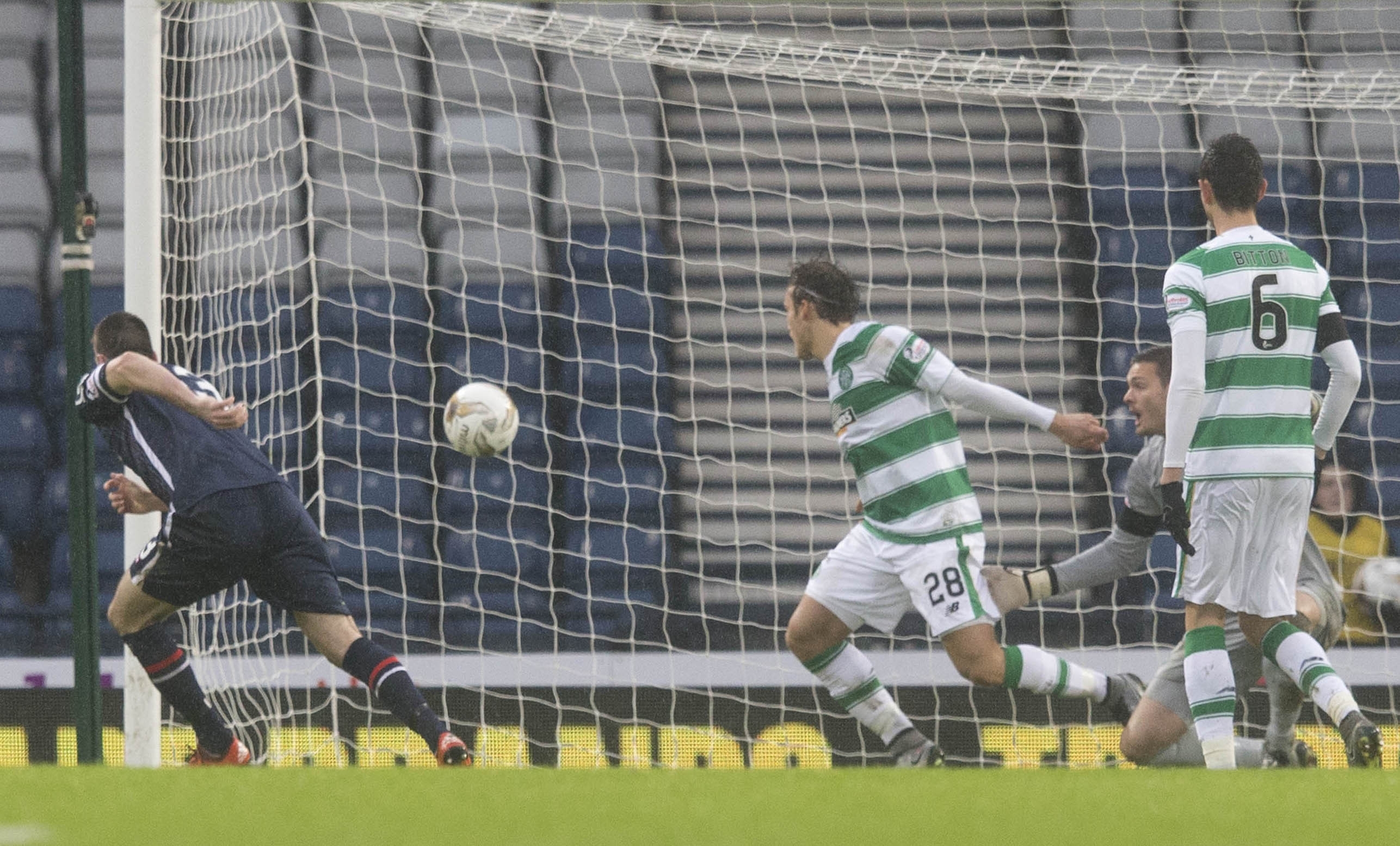 Ross County's Paul Quinn scores his side's second goal of the game 