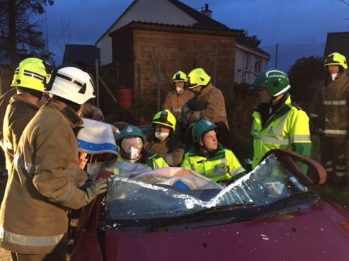 Firefighters and police officers will take part in a mock crash in an Aberdeenshire town next month as they campaign for safer roads across the region.