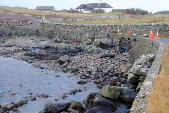 Repair work is under way on the sea road in Lerwick where the weather has taken its toll, leaving families unable to reach their homes by car.