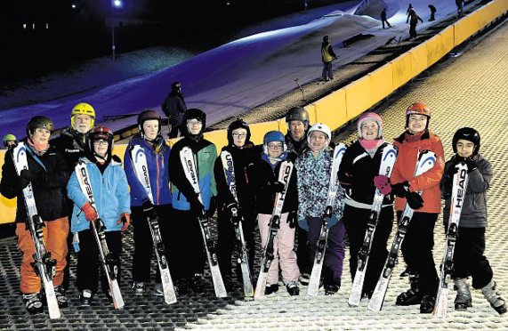 Members of the Grampian area ski team, from left, Kristen Wrate, head coach Malcolm Campbell, Stephanie Salvesen, Ruth Barclay, Ryan McKenzie, Owen Stephen, Lauren Cain, coach Bob Thow, Cathryn Mearns, Emma Ronald, Joshua Marshall and Arymehr Zarisfi. Photograph: Kami Thomson