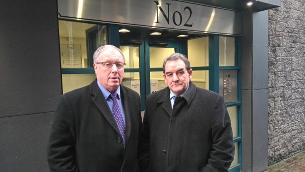Liquidators Tom Hughes (left) and Harry Seddon outside the tribunal building in Inverness