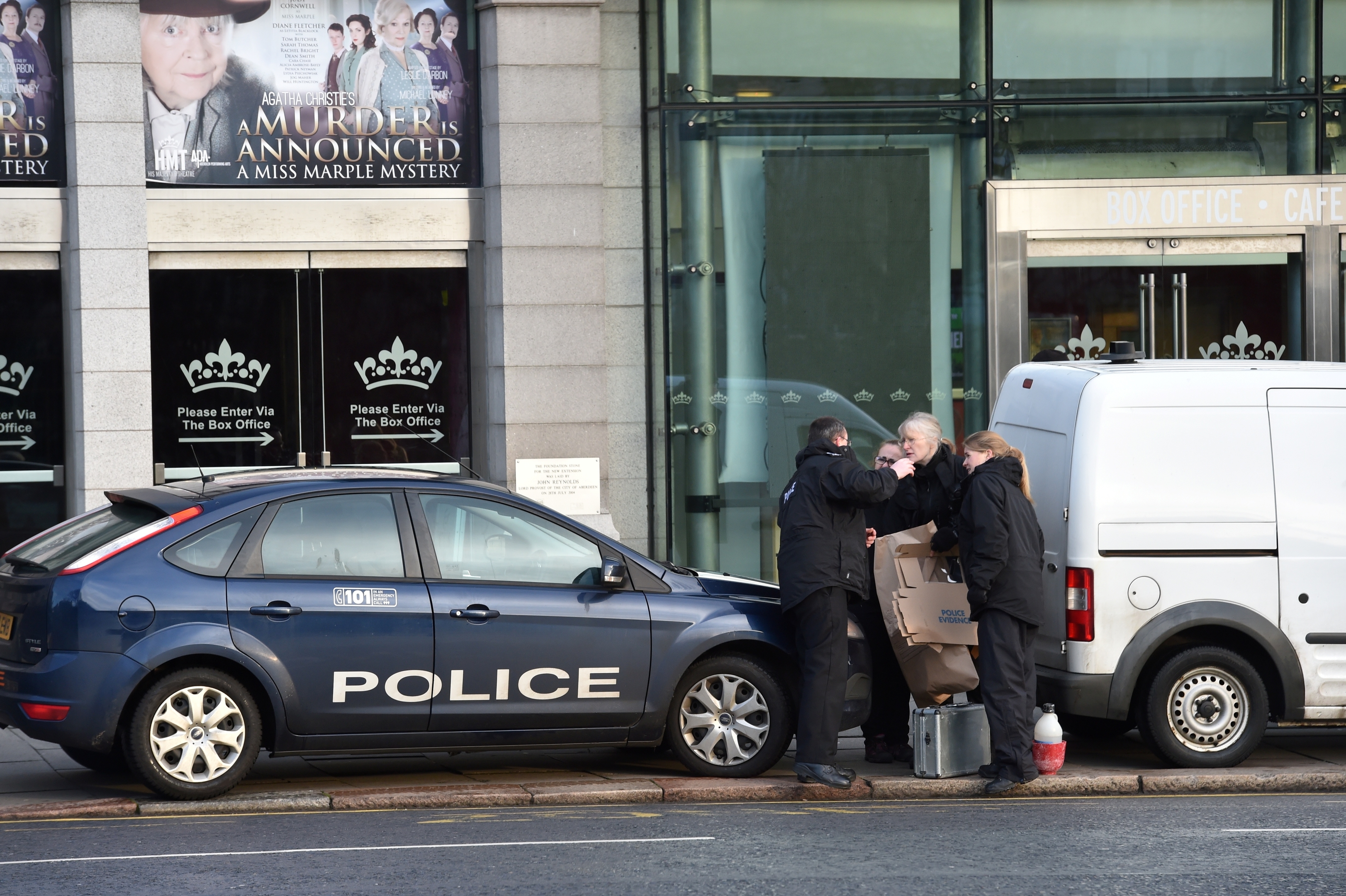 Police and forensic officers attend Union Terrace Gardens. Note the Murder Announced poster! 