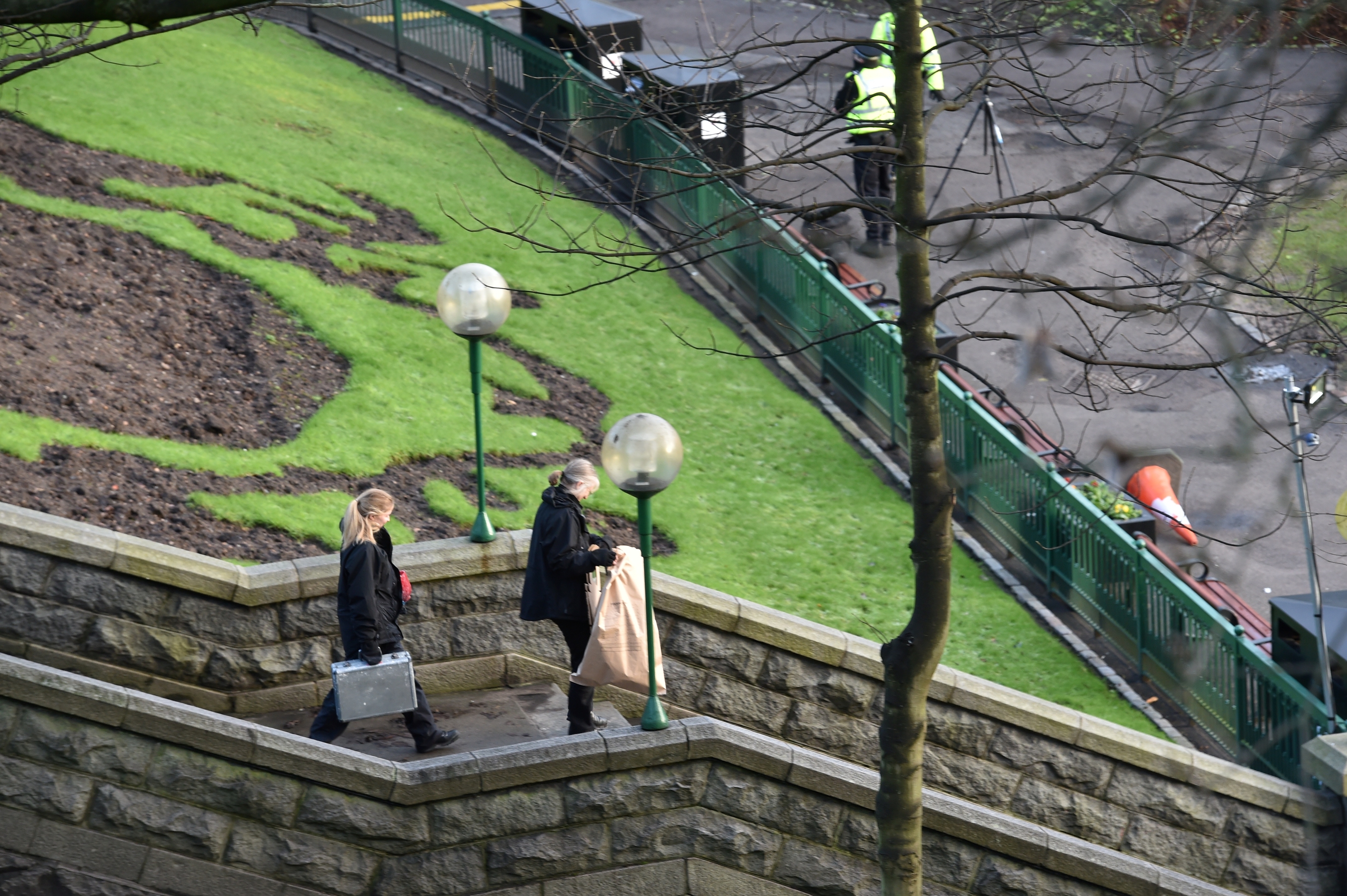 Police and forensic officers attend Union Terrace Gardens. 