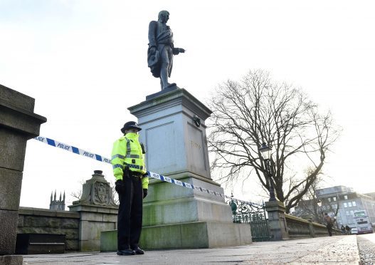 Police and forensic officers attend Union Terrace Gardens.