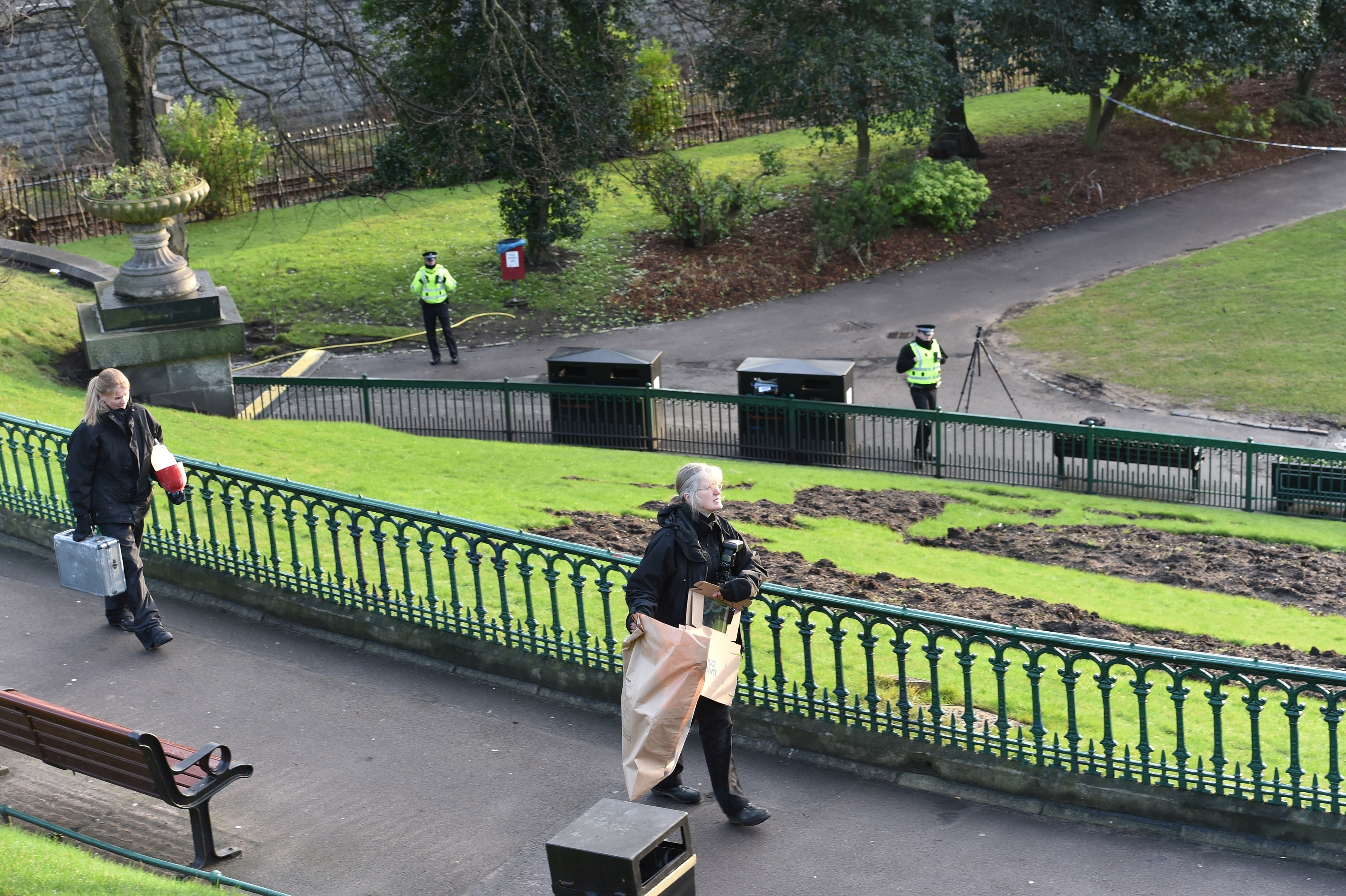 Police and forensic officers attend Union Terrace Gardens. 