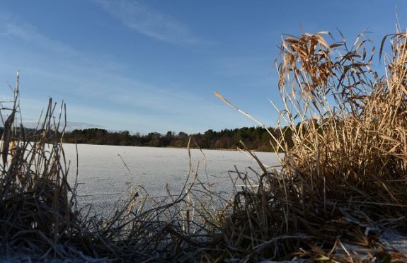 Loch of Skene shows signs of the plummeting temperature. (Picture: Colin Rennie)