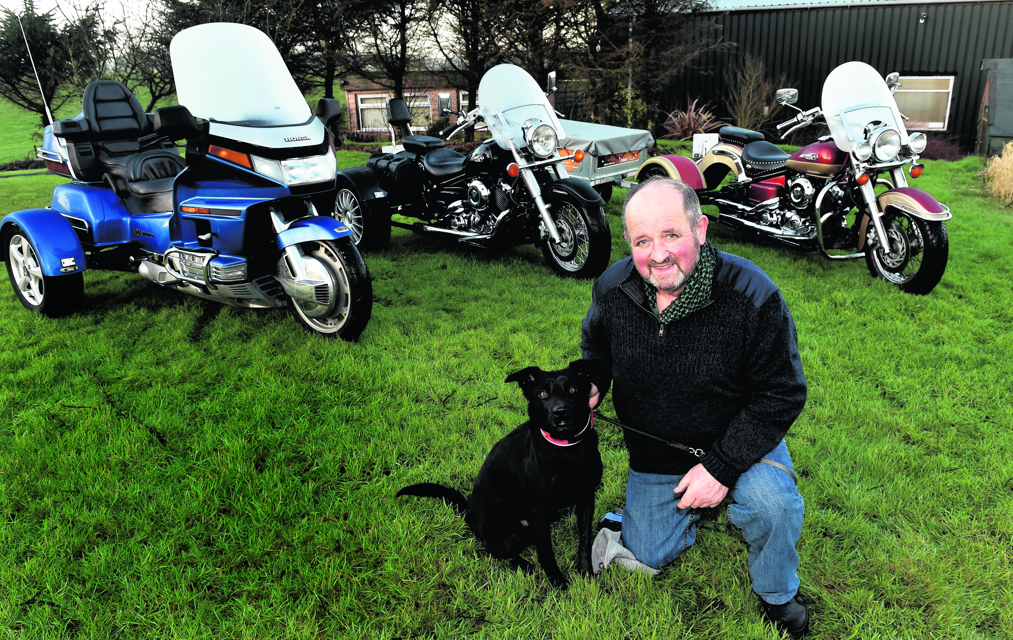 Your Car - Brian Gray from Balmedie with his three trikes - and dog Timmy. Picture by COLIN RENNIE January 22, 2016.