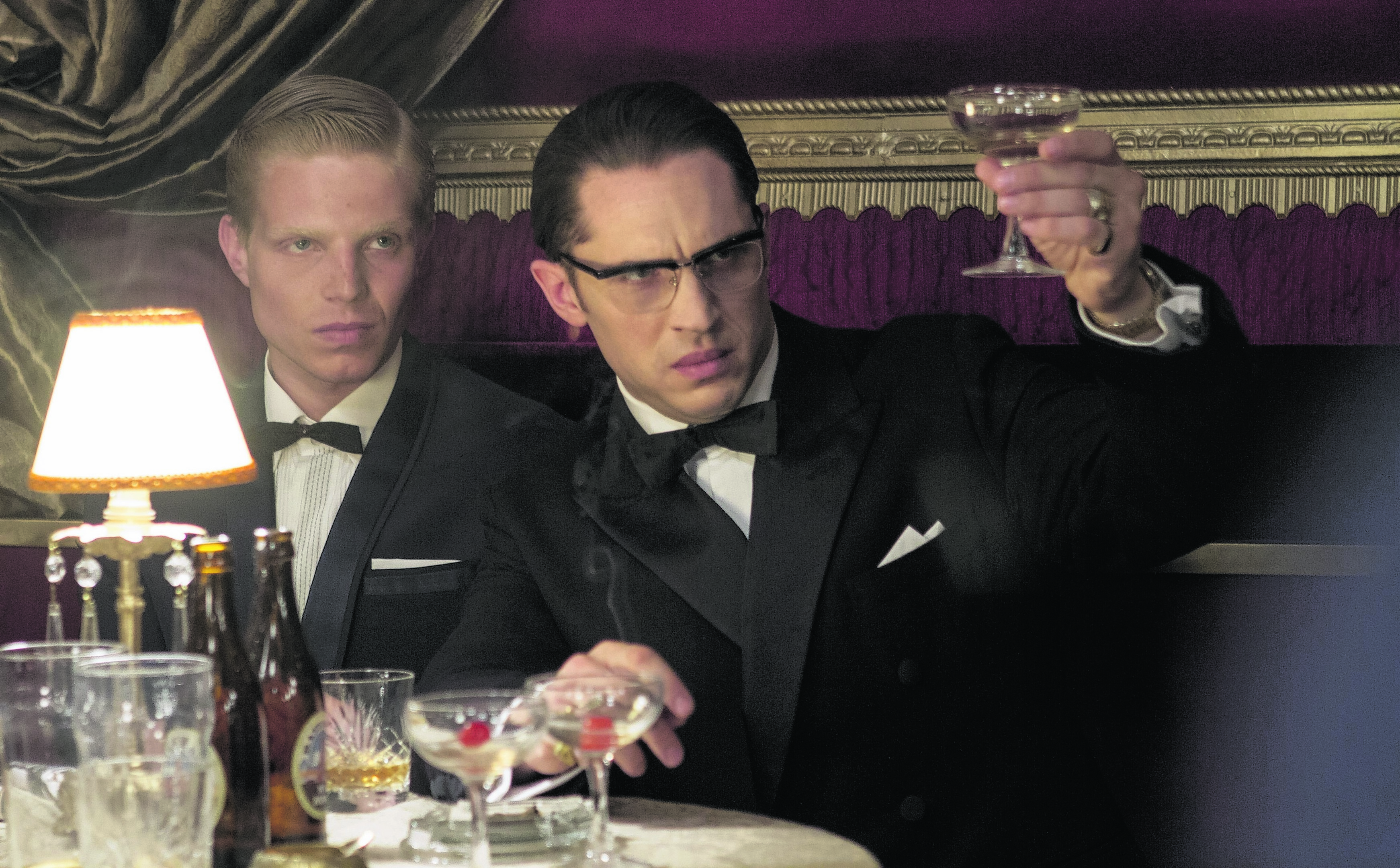 Tom Hardy, right, plays both Krays in Legend
