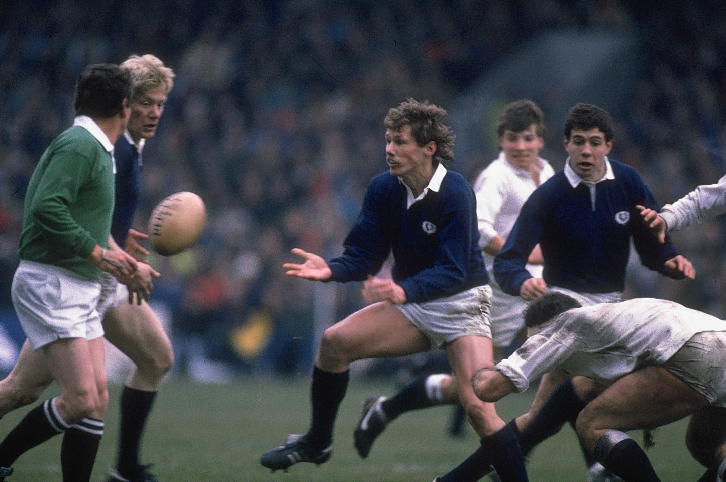 John Jeffrey (left) of Scotland receives the ball from John Rutherford during the Five Nations Championship win against England 