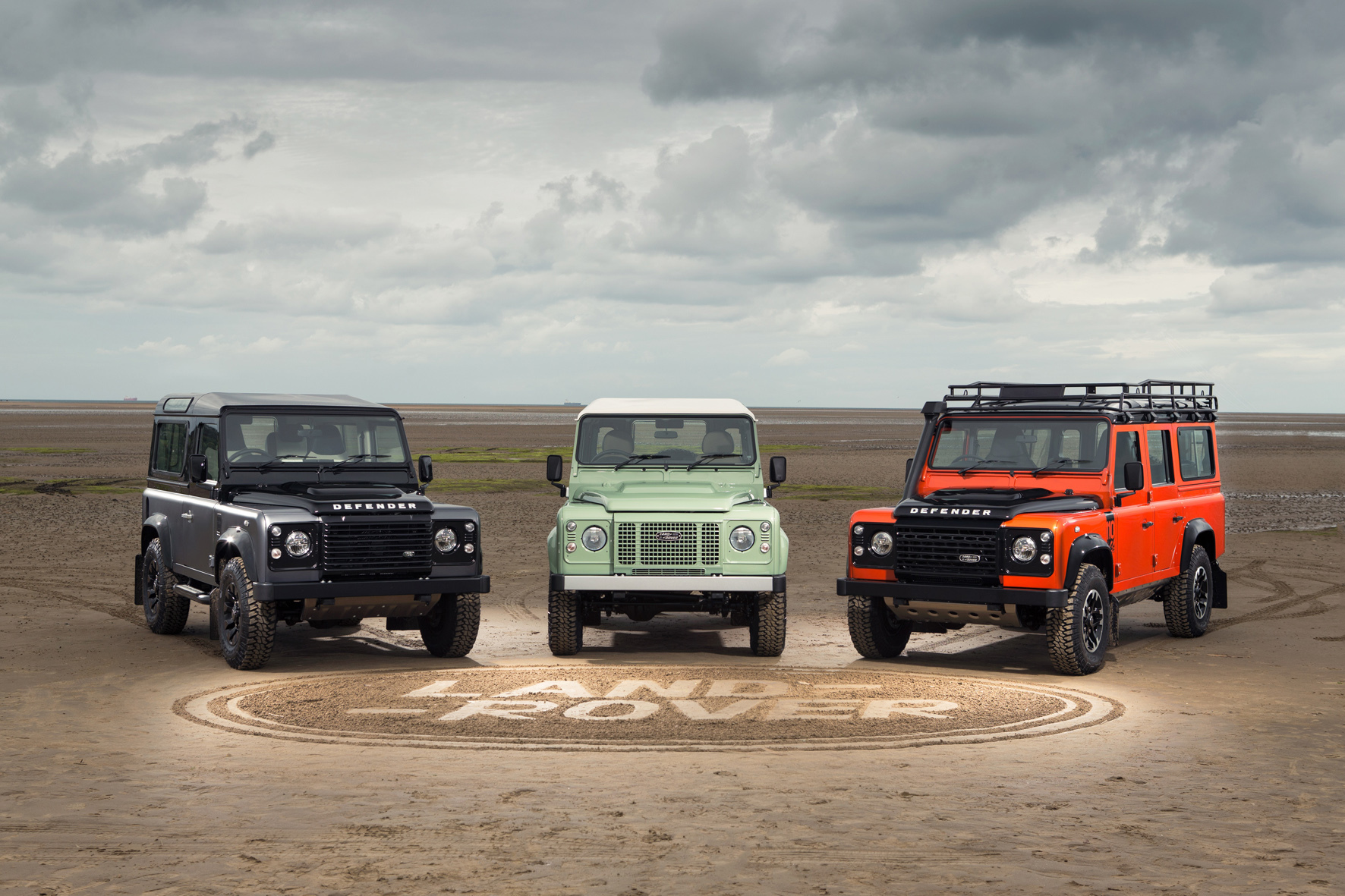 2015 Land Rover Defender Autobiography, Heritage and Adventure Editions (L-R)