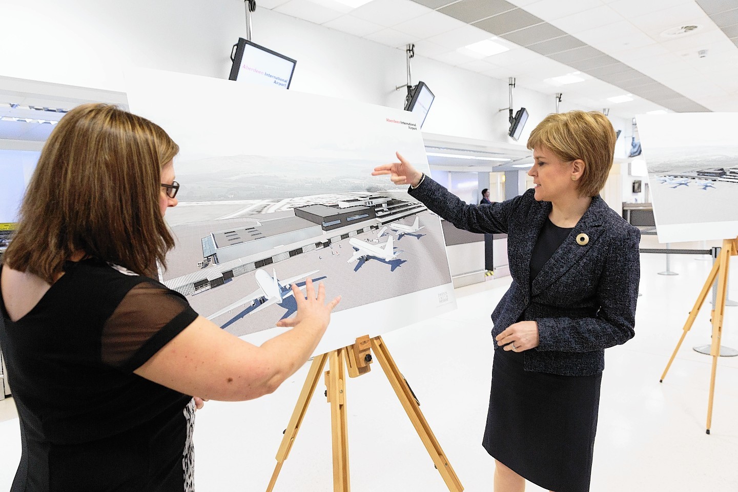 Nicola Sturgeon discusses the proposals with Carol Benzies, managing director of the airport