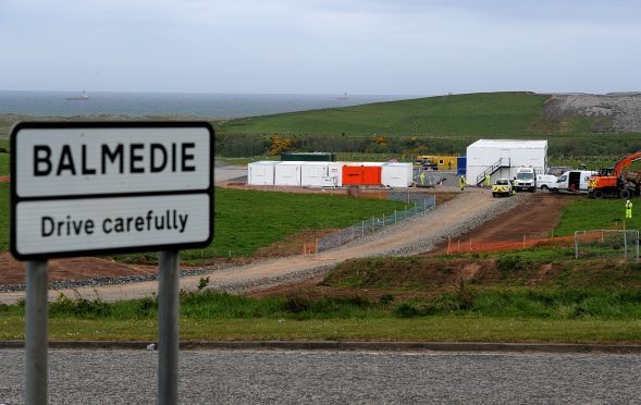 Workers besides the Balmedie AWPR site