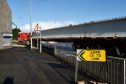 The AWPR lorries move through Aberdeen, transporting the large beams