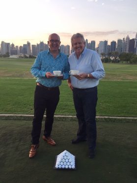 Colin Montgomerie and Aberdeen businessman, David Reid enjoy a cup of tea on the tee in aid of Maggie's