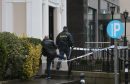 Gardai outside the Regency Hotel in Dublin after one man died and two others were injured following a shooting at the hotel.