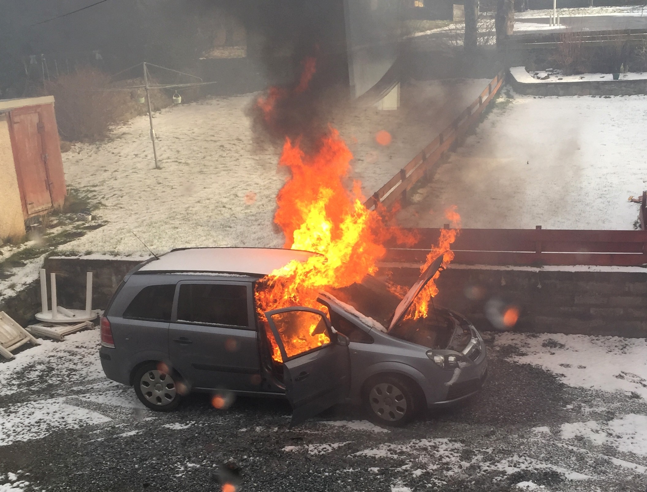 The Nicoll's car on fire on Elgin Road, Keith