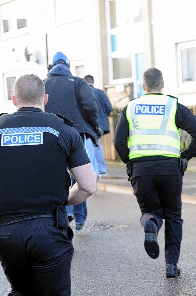 Police carried out drug raids in Elgin and Buckie