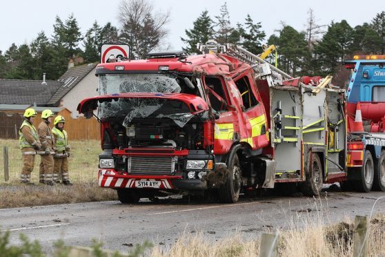 Five firefighters were taken to hospital following the crashes