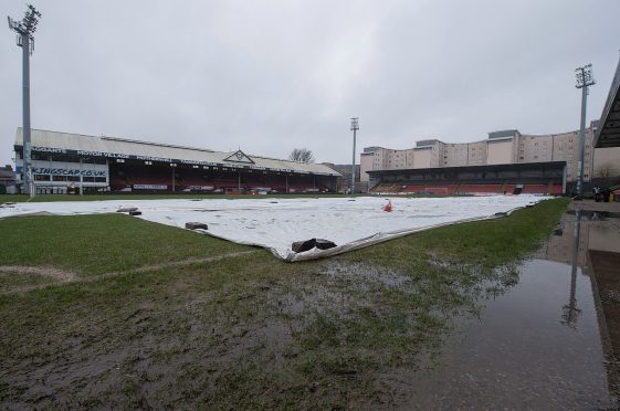 The waterlogged Firhill pitch