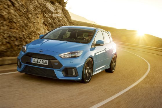 Ford Focus RS 2016 mountain road front sun