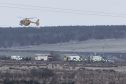 The air ambulance comes in to land at the crash scene on the A9, about half a mile South of the Georgemas Railway Bridge.