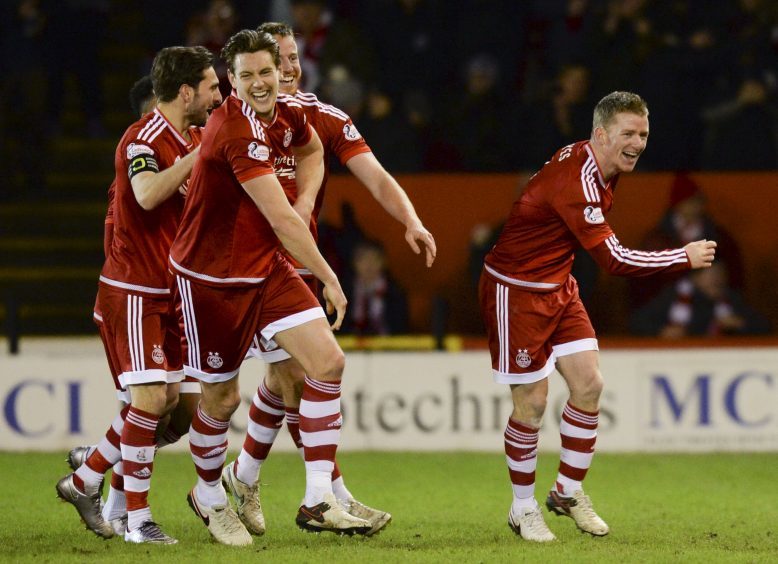 Jonny Hayes (right) celebrates his goal with his team-mates