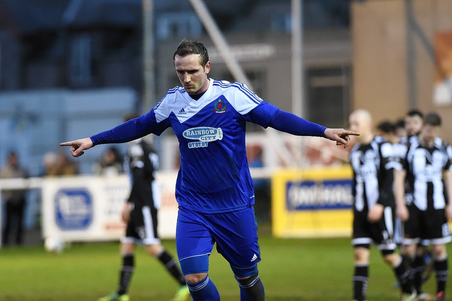 Cove's Jonathan Smith celebrates after scoring against Wick 