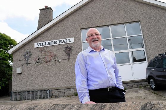 Maud's village hall, pictured with secretary Pat Buckman, was awarded £1,000 to refurbish a kitchen.