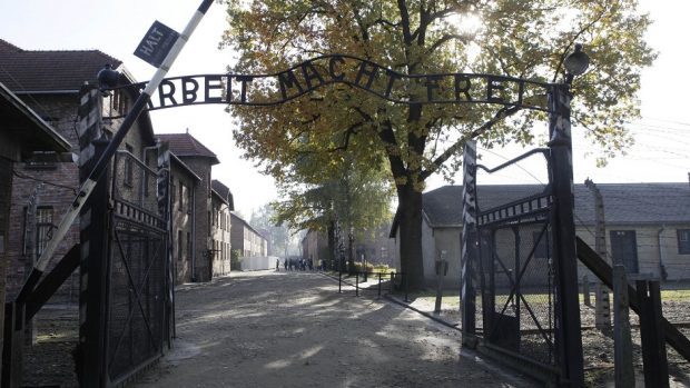 The entrance gate of the former Nazi death camp at Auschwitz (AP)