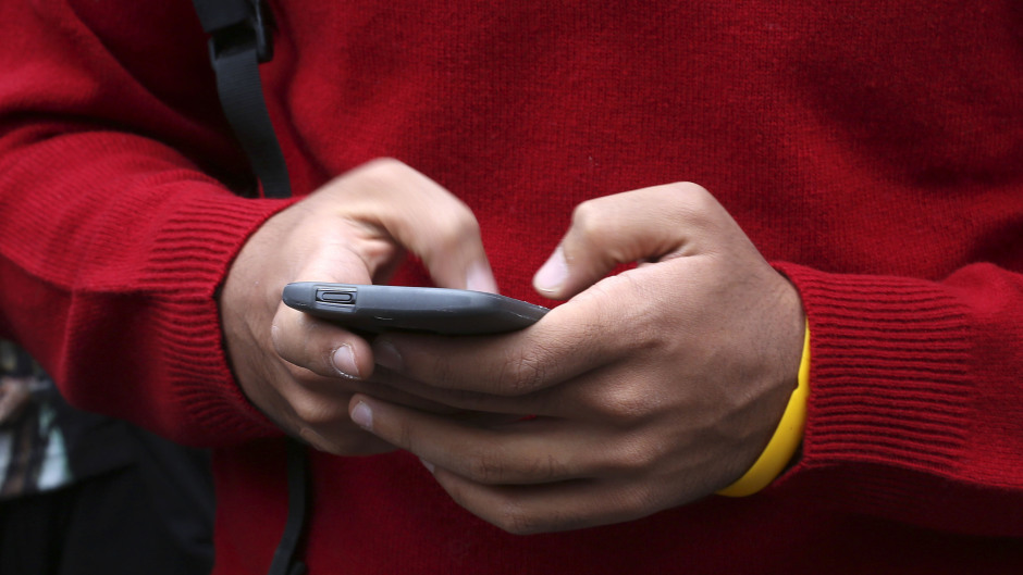 Councillors could soon be allowed to use their public-issue smartphones outside of work.