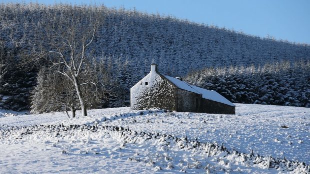 Snow-covered hills of the Carron Valley in Stirling, Scotland, as snow, ice and sub-zero temperatures sweep the country.