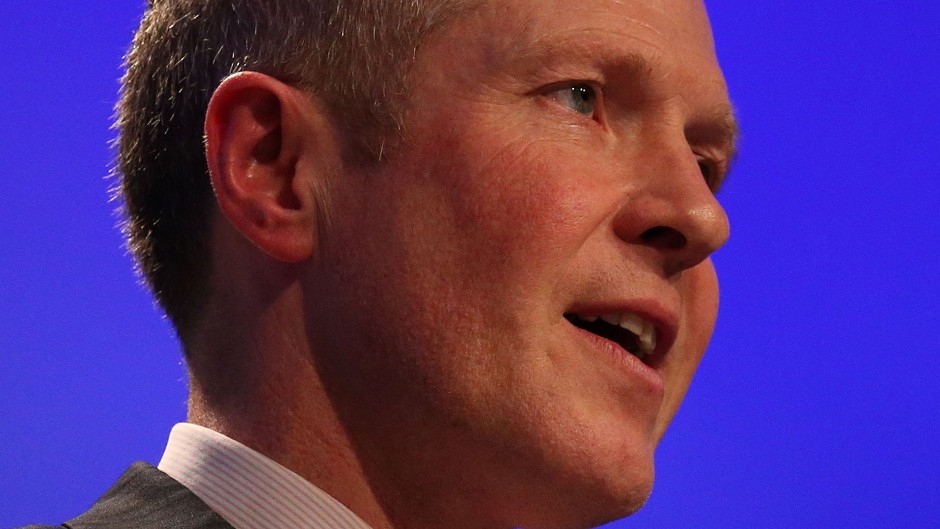 Scottish Lib Dem leader Willie Rennie has committed to creating a "zero-rate" tax band to help low and middle income earners