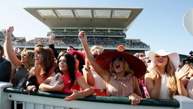 Crowds watch on at last year's Grand National