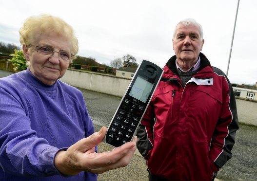Margaret Wood, pictured with councillor Ian Gray, has been unable to make calls since December.