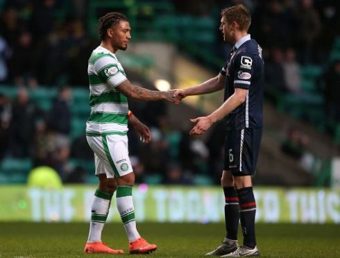 Ross County's Chris Robertson shakes hands with Celtic's Colin Kazim-Richards