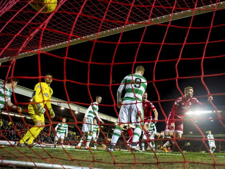 Aberdeen's Simon Church (right) celebrates his goal.