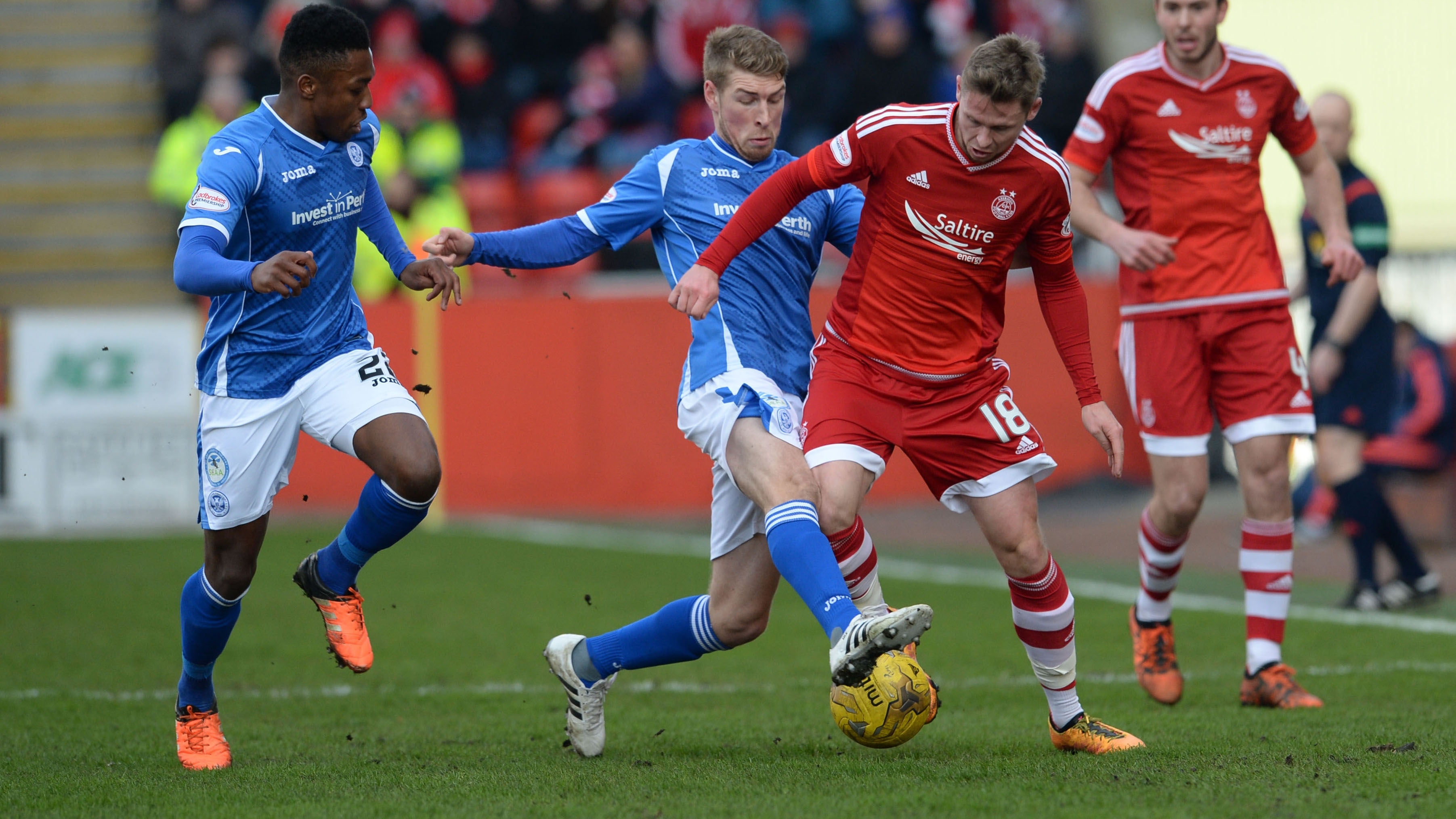 Aberdeen goalscorer Simon Church battles for possession