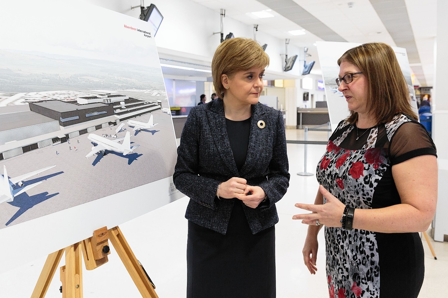 Nicola Sturgeon discusses the proposals with Carol Benzies, managing director of the airport