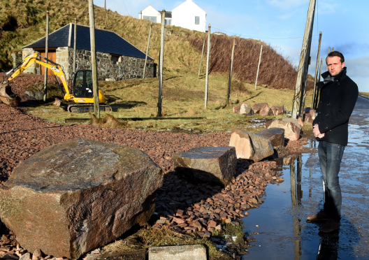 Councillor Stephen Flynn, close to the site where even more boulders have been dumped