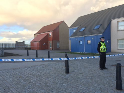 An investigation is under way after a man's body was discovered in a Fraserburgh property