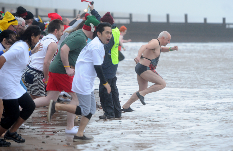 This year's nippy dip raised more than £14,000