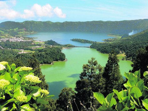 At Sete Cidades on Sao Miguel, two adjoining lakes, one blue, the other green...