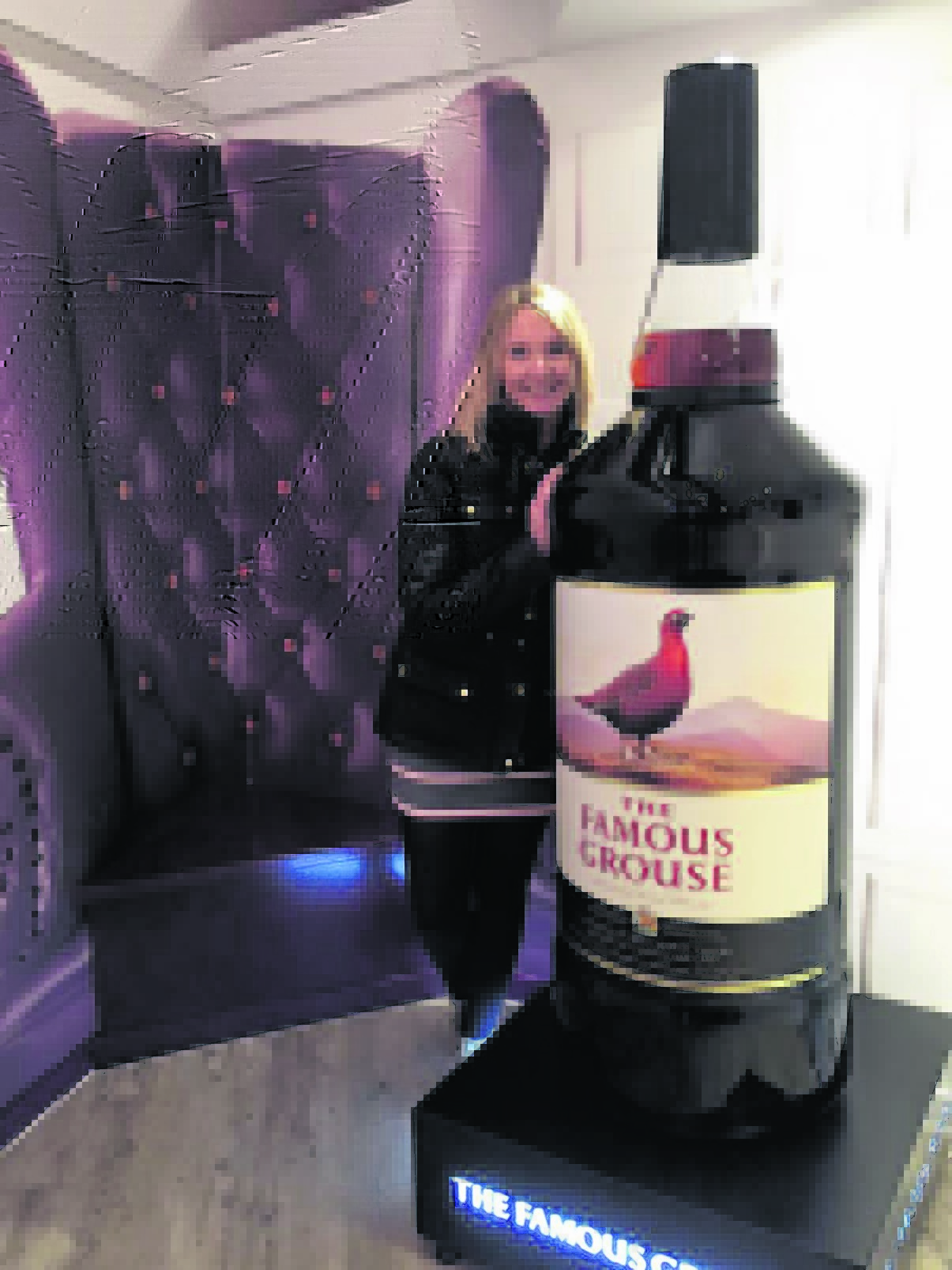 Lesley gets to grips with the biggest bottle of whisky in the world