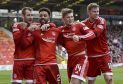 Shay Loganis congratulated by team mates Niall McGinn, Cammy Smith and Simon Church after scoring Aberdeen's second goal