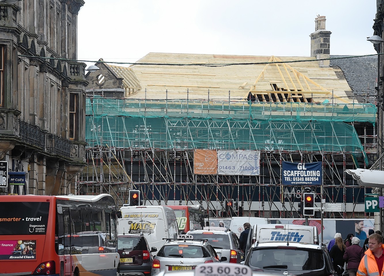The M&Co  building in Academy Street, Inverness takes shape again following last year's devastating fire.