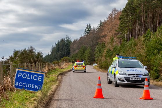 Police at the scene of the crash on the B9010